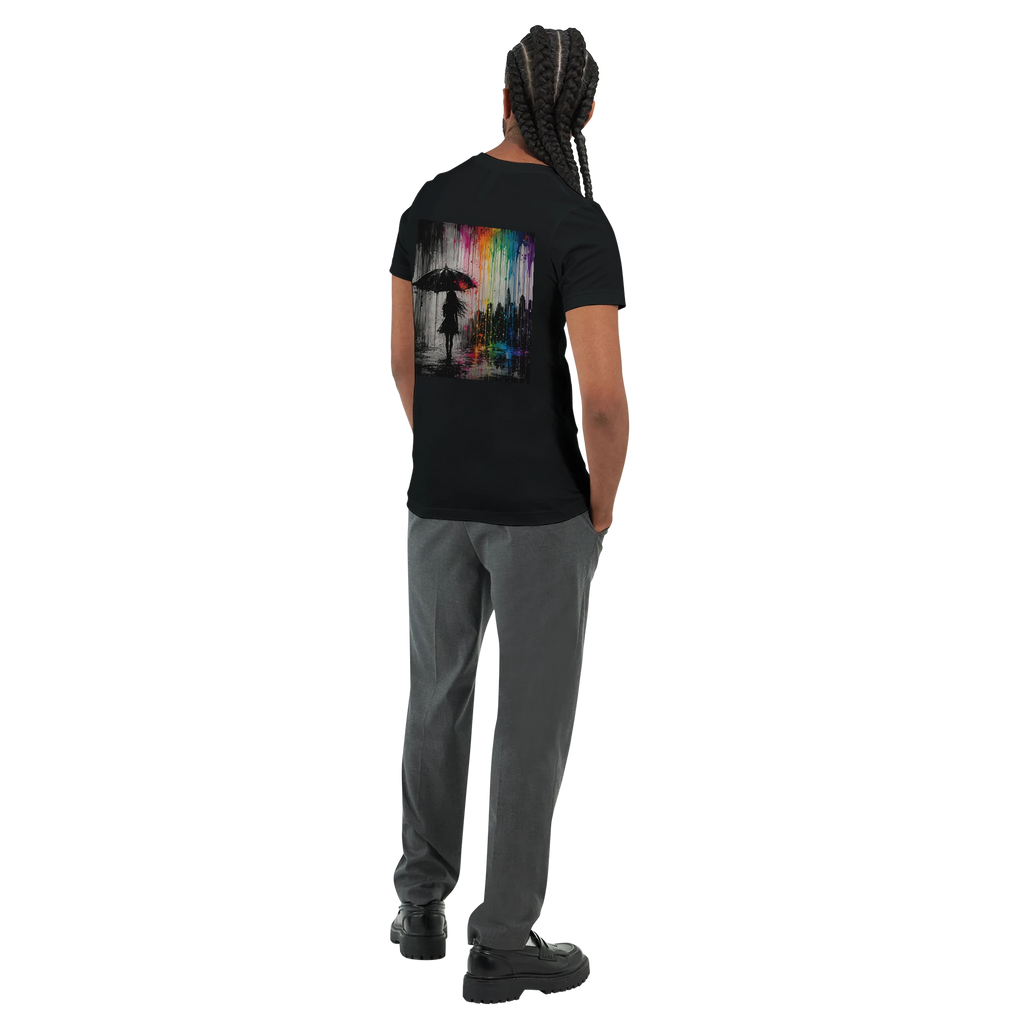 Black unisex T-shirt shown from the back featuring the “Color the Grey” design with a woman under an umbrella, a monochrome city skyline, and neon rainbow graffiti colors.