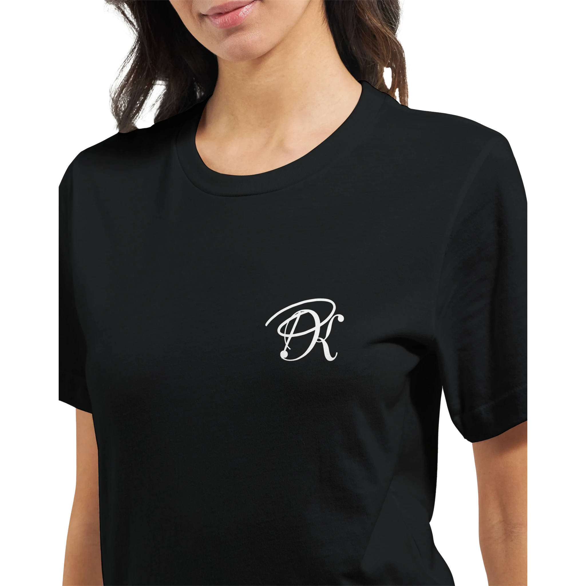 Close-up of a female model wearing a black “Color the Grey” unisex T-shirt, featuring a subtle white PK monogram on the front chest.