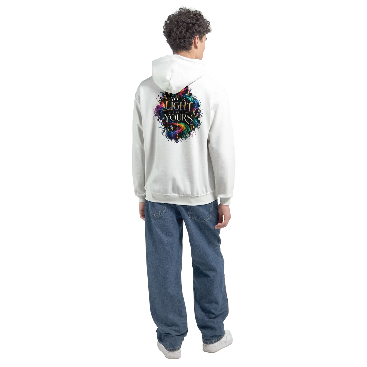 Male model wearing a white hoodie with the colorful “Your Light Is Still Yours” back print, shown from behind with blue jeans against a transparent background.