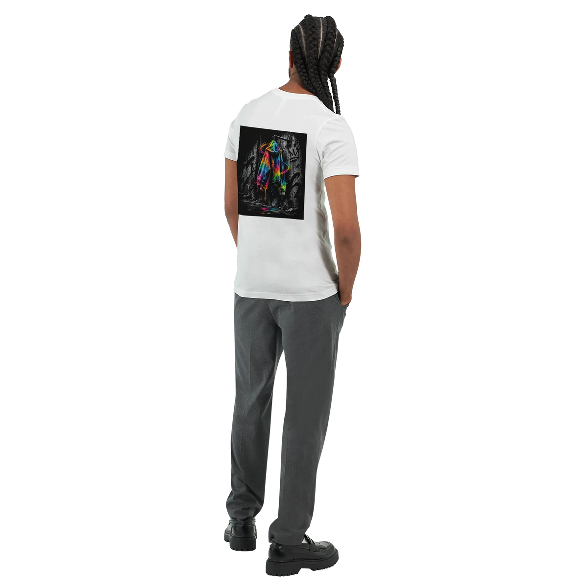 Male model shown from behind wearing a white T-shirt with a vivid neon rainbow hoodie back print against a black-and-white graffiti background, paired with dark grey trousers for a modern urban streetwear look.