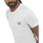 Male model wearing a white T-shirt with a small black PK logo on the chest, shown in a close-up front view with a clean, minimal streetwear look.