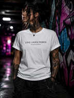 A person wearing a white t-shirt with the text "LIVE UNFILTERED. Personía Kálido" stands in front of a colorful graffiti-covered wall.