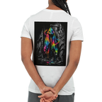 White statement T-shirt featuring a bold back print of a neon rainbow hoodie against a black-and-white graffiti wall. The vivid colors stand out strongly from the monochrome background, creating an expressive urban streetwear look.