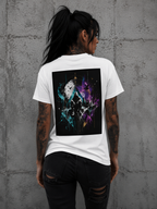 tattooed woman wearing a Personiq Kaleido T-shirt with colorful butterfly artwork on the back, symbolizing transformation and expressive streetwear.