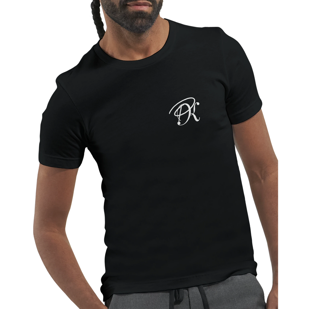 Close-up of a black unisex statement T-shirt on a male model, featuring a small white PK monogram on the chest and a clean minimalist front design.
