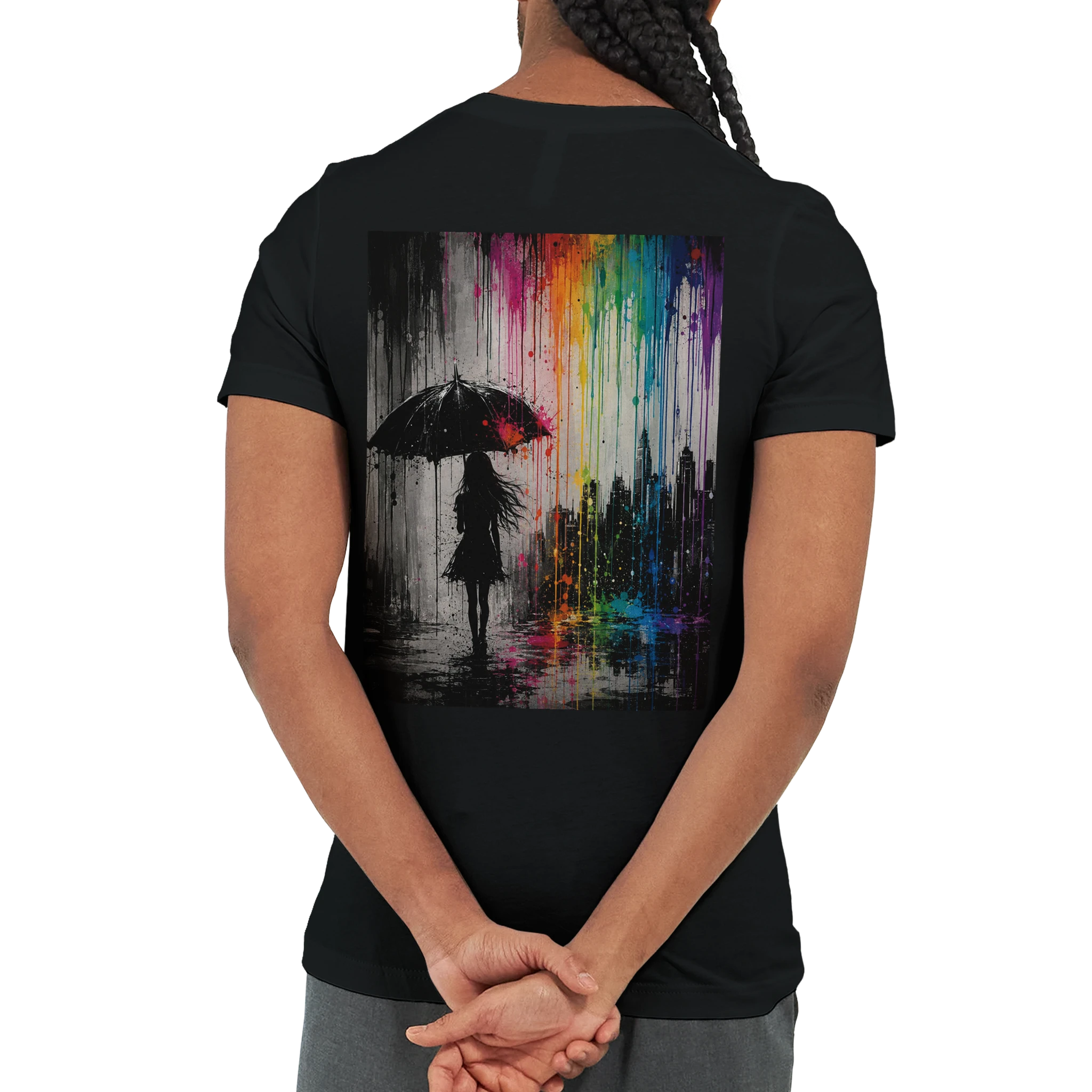 Black unisex T-shirt shown from the back featuring the “Color the Grey” design with a woman under an umbrella, a monochrome city skyline, and neon rainbow graffiti colors.