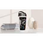A 15oz stainless steel travel mug displayed on a modern desk beside stacked books and decorative vases. The mug features a surreal street art illustration of a fractured vintage clock, blending a predominantly black-and-white composition with vibrant rainbow powder splashes, geometric fragments, and expressive paint drips to symbolize time, creativity, and transformation.