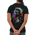 Black unisex T-shirt shown from the back with a large surreal urban artwork featuring a monochrome male portrait, a city scene and vibrant rainbow neon color splashes.